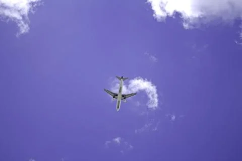 Airplane in sky Stock Photos