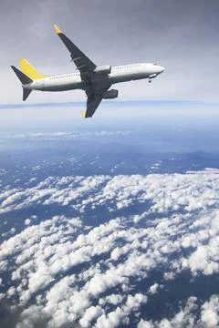 Airplane in the sky. Stock Photos