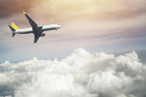 Airplane in the sky. Stock Photos