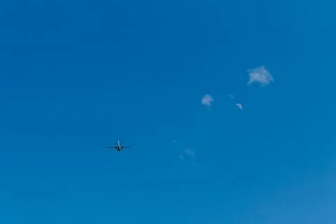 Airplane in the sky. Stock Photos