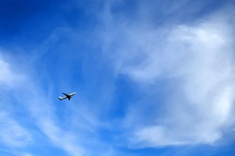 An airplane in the sky Stock Photos