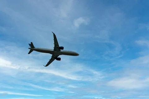 Airplane in the sky. Stock Photos