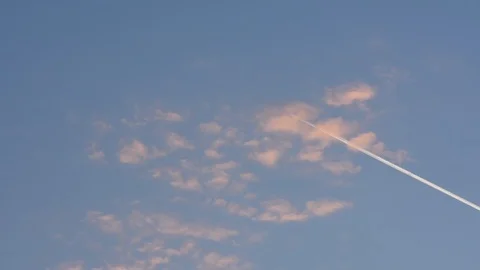 Airplane in the sky at the sunset Stock Footage 126712298