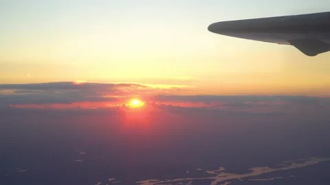 Airplane in the sky at sunset Stock Footage 170572517