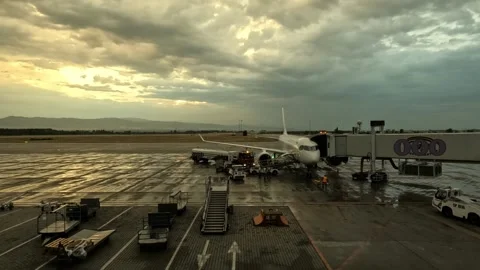 Airplane at Sofia Airport being loaded with luggage, refueled Stock Footage 315555153