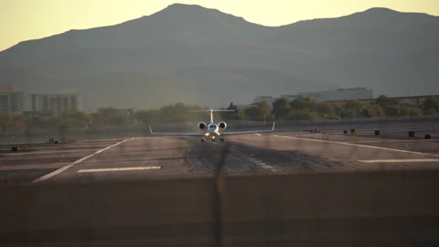 Airplane is speeding up and taking off from Harry Reid Stock Footage 273117846