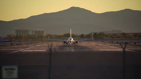 Airplane is speeding up and taking off from Harry Reid Stock Footage 273119443