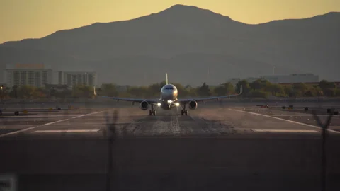 Airplane is speeding up and taking off from Harry Reid Stock Footage 273124546
