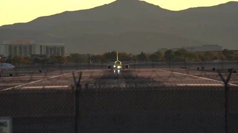 Airplane is speeding up and taking off from Harry Reid Stock Footage 273124626