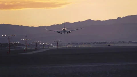 Airplane is speeding up and taking off from Harry Reid Stock Footage 273562698
