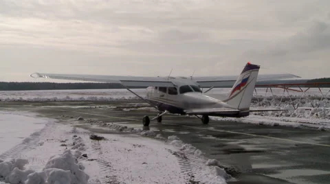 Airplane standing on a runway. Stock-Footage 67547383