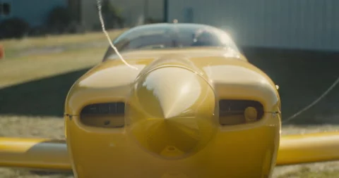 Airplane starts up: Front Propeller view Stock Footage 232185304