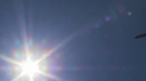 Airplane &amp; sun Stock Footage 1007220