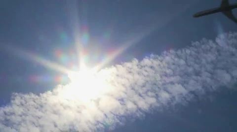 Airplane &amp; sun Stock Footage 1007237