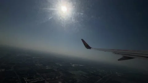 Airplane sunset blue sky Stock Footage 232082605