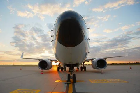 Airplane at the sunset Stock-Fotos