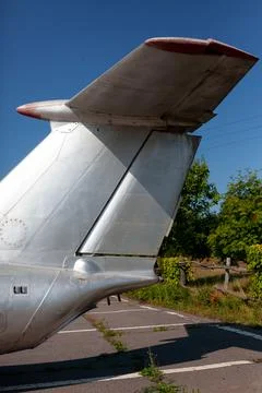 Airplane tail fin of vintage jet plane Aero L-29 Delfin. Aluminum aircraft tail Stock Photos