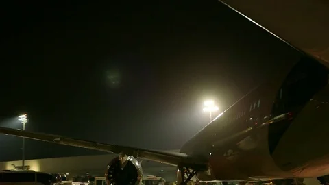 Airplane tail at night Stock Footage 77101350