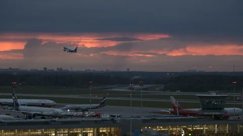 Airplane take-off in the dusk Stock Footage 116556431
