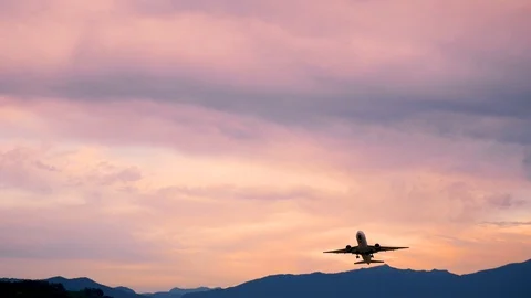 Airplane Take off Sochi at sunset or sunrise Stock Footage 113400032