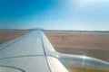 The airplane take off on the sunny background Photo