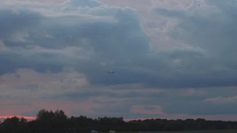 Airplane take off at sunset Stock Footage 119870762