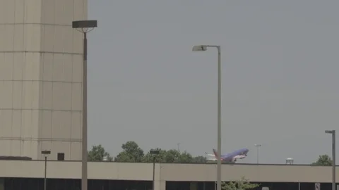 Airplane takeoff from KCI Stock Footage 70819612