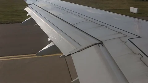 Airplane at takeoff. View trough window. Video stock 80521634
