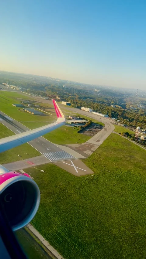 Airplane Takeoff Window View Over City Stock Footage 328294713