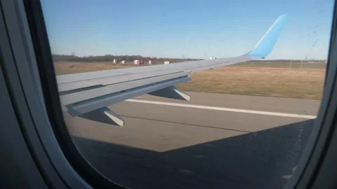 Airplane is taking off. Air View from plane window. Travel and transport concept Stock Footage 237469384