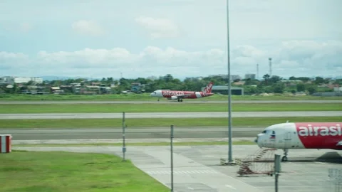 Airplane taking off, Airasia Stock Footage 325173689