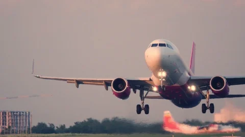 Airplane taking off. Aircraft takes off at sunset Stock Footage 112728112