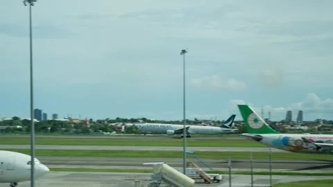 Airplane taking off, Cathay Pacific airline Stock Footage 325173528