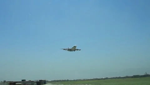 Airplane taking off on a clear day Stock Footage 7731313