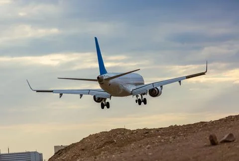 Airplane taking off close-up Stock Photos