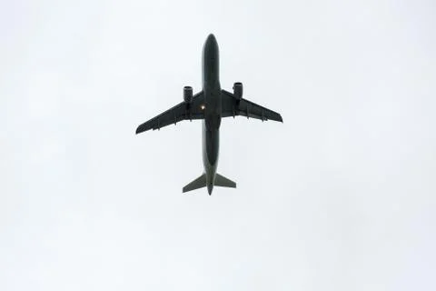 Airplane taking off during rain Stock Photos