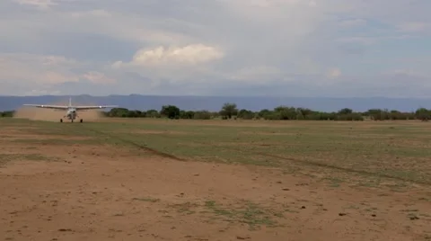 Airplane taking off from field Stock Footage 49010306