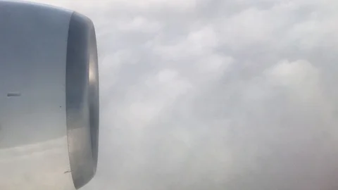 Airplane taking fly over cloud , view from window of passenger Stockbeeldmateriaal 100861069
