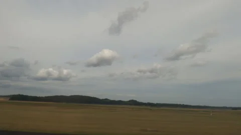 Airplane taking off the ground, side view from the passenger's window Vídeos de archivo 220788110