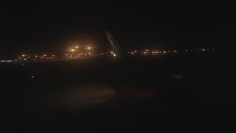 Airplane Taking Off at Night Stock Footage 114585639