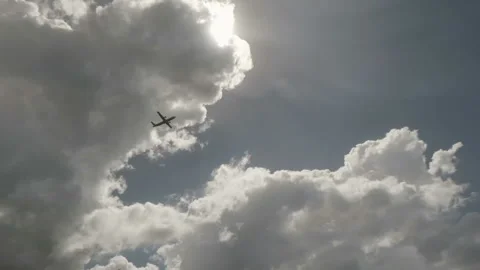 An airplane taking off. Plane flying in blue sky Stock Footage
