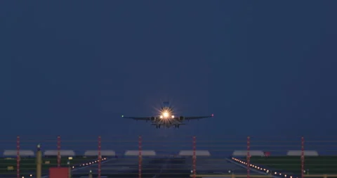 Airplane taking off from runway at dusk. Stock Footage 333777503