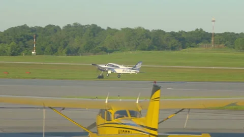 Airplane Taking Off on Runway Stock Footage 142115884