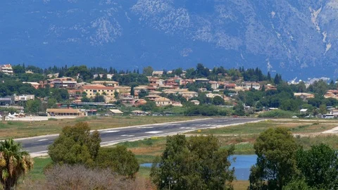 Airplane taking off from runway, side view Stock Footage 112354407