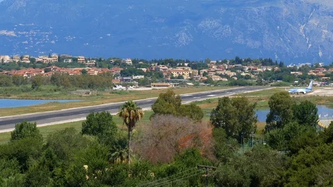 Airplane taking off from runway, side view Stock Footage 112580508