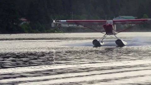 Airplane taking off from the sea 스톡 동영상 83179873