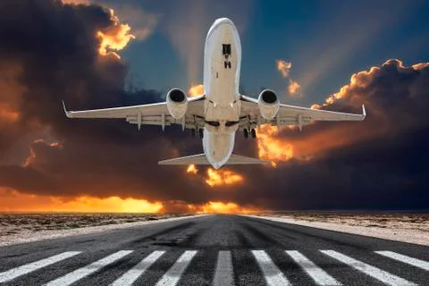 Airplane Taking Off in the Sun. Stock Photos