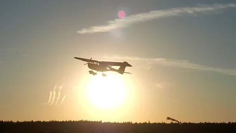 Airplane taking off at the sunset Stock Footage 71271649