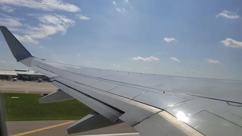 Airplane Taking Off, View of Wing from Window Stock Footage 146551567