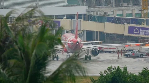 Airplane taxiing after landing Stock Footage